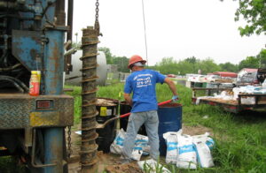 cleaning up leaking gasoline at station