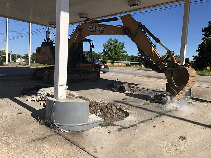 digging out an underground storage tank